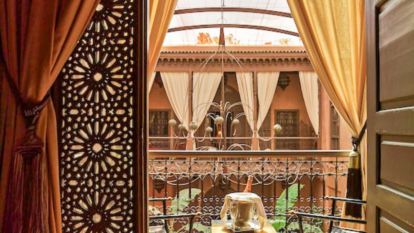 Luxury riads in Marrakech: Riad Noir d'Ivoire featuring exquisite decor and a serene balcony view.