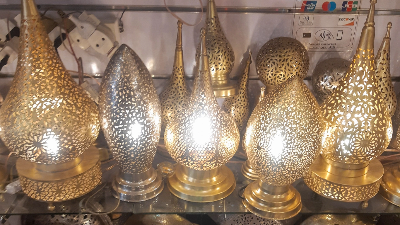 Colorful Moroccan lanterns displayed in a shop, perfect for decoration - what to buy in Marrakech