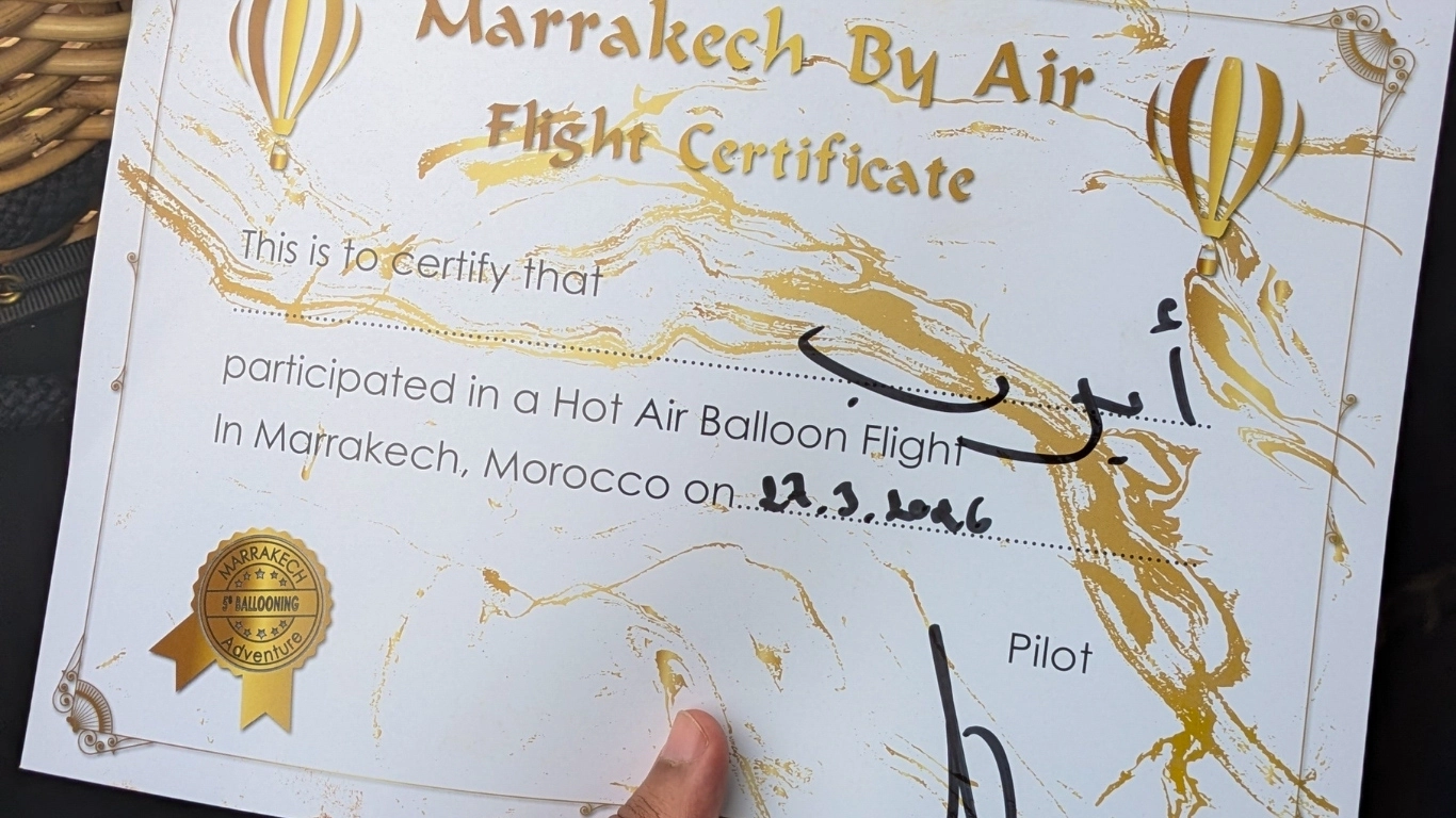 Marrakech By Air hot air balloon flight certificate with Arabic name and date, issued after a balloon ride over Marrakech, Morocco.
